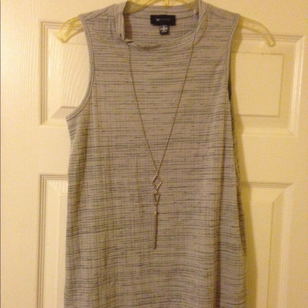 Gray top with necklace piece